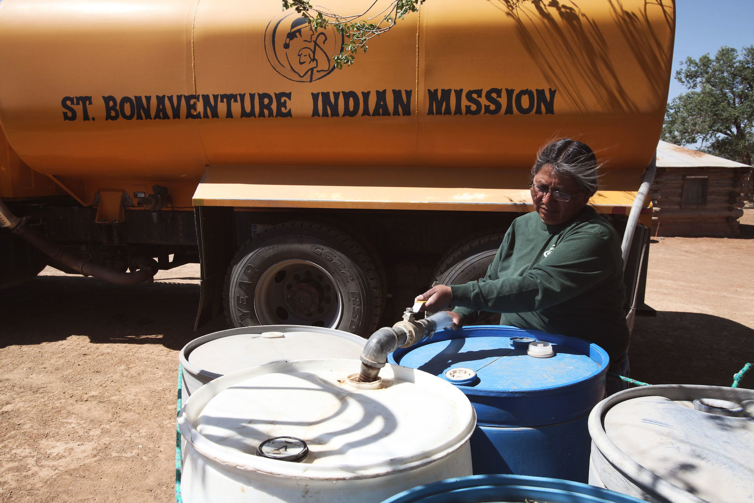 Navajo Nation woman drives truck to deliver water to the people